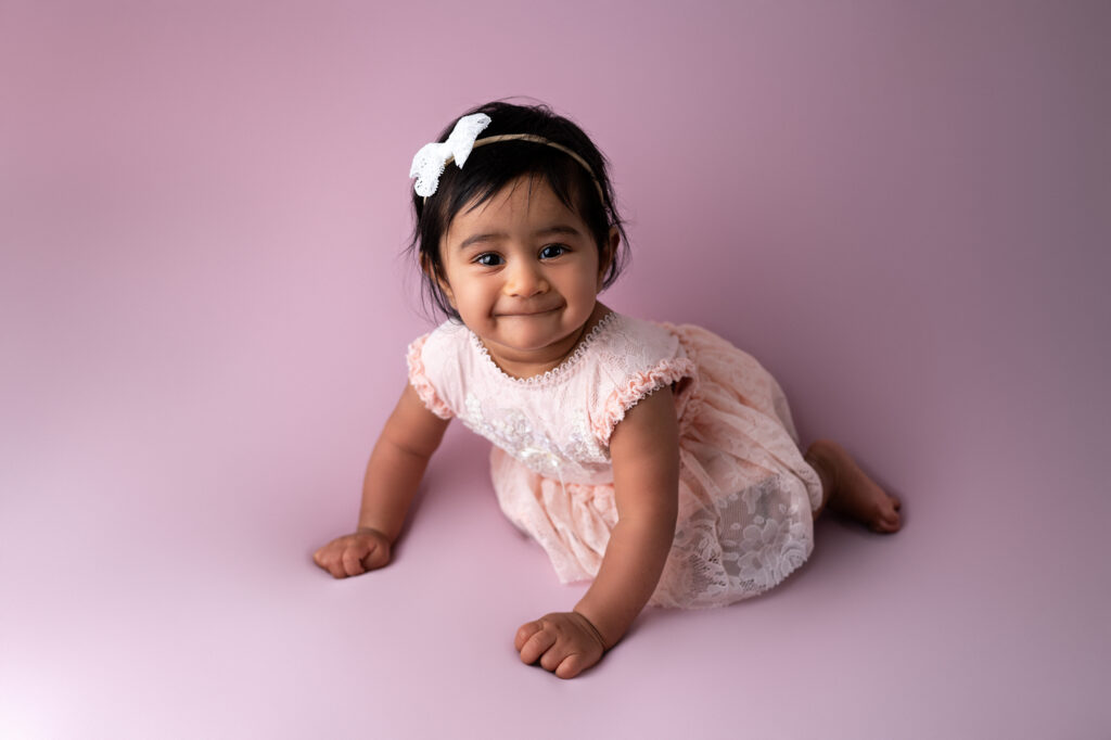 bébé de neuf mois sourire photographe bébé Houilles photographe bébé carrières-sur-seine photographe bébé sartrouville photographe bébé chatou photographe bébé montesson photographe bébé yvelines photographe bébé hauts de seine photogrpahe bébé versailles photographe bébé paris