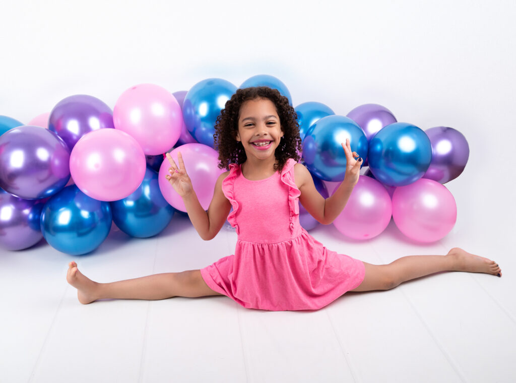 Petite fille de neuf ans ballons Photographe enfants Houilles photographe enfants la Défense photographe enfants Yvelines photographe bébé Houilles photographe bébé la Défense photographe bébé Yvelines